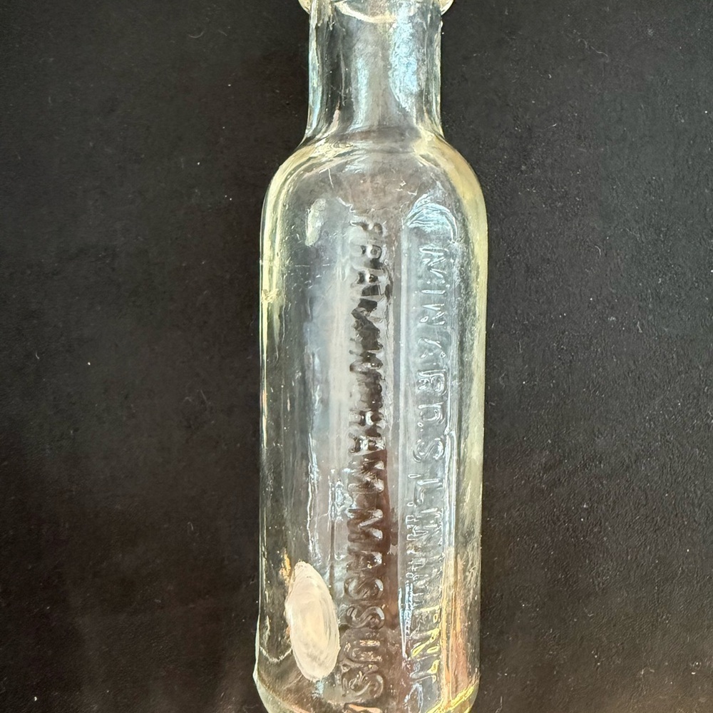 Minnard’s Linniment Embossed Glass Bottle 5 inches ANTIQUE